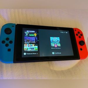 Nintendo switch (basically brand new,no flaws, handful of uses)